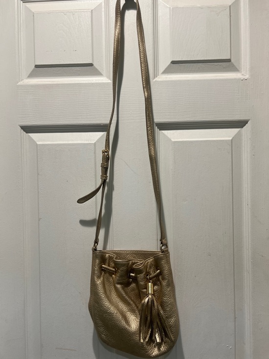 Michael Kors Handbags - Michael Kors Gold Metallic Leather Drawstring Crossbody
